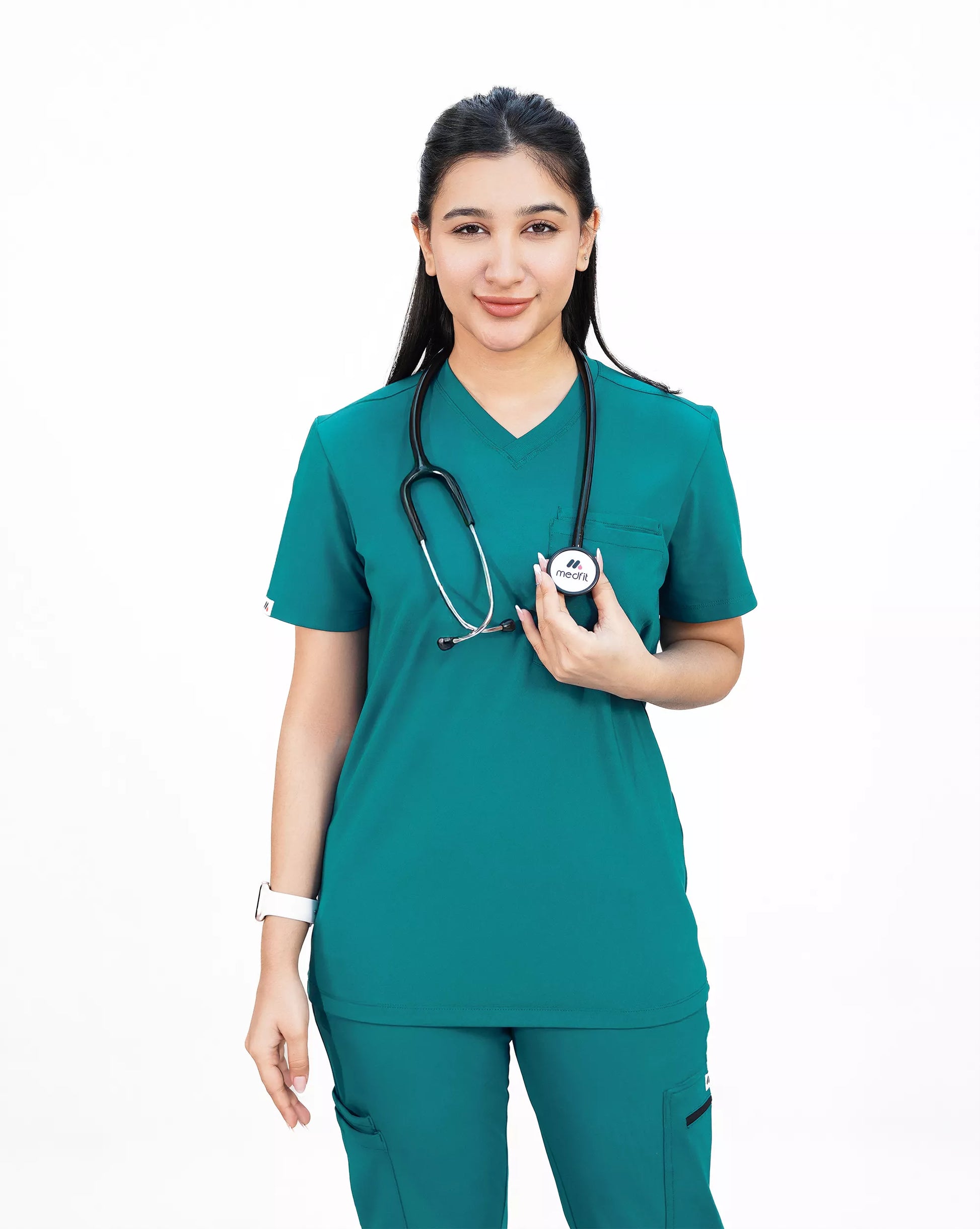 Person in teal medical scrubs with a stethoscope and syringe on a white background