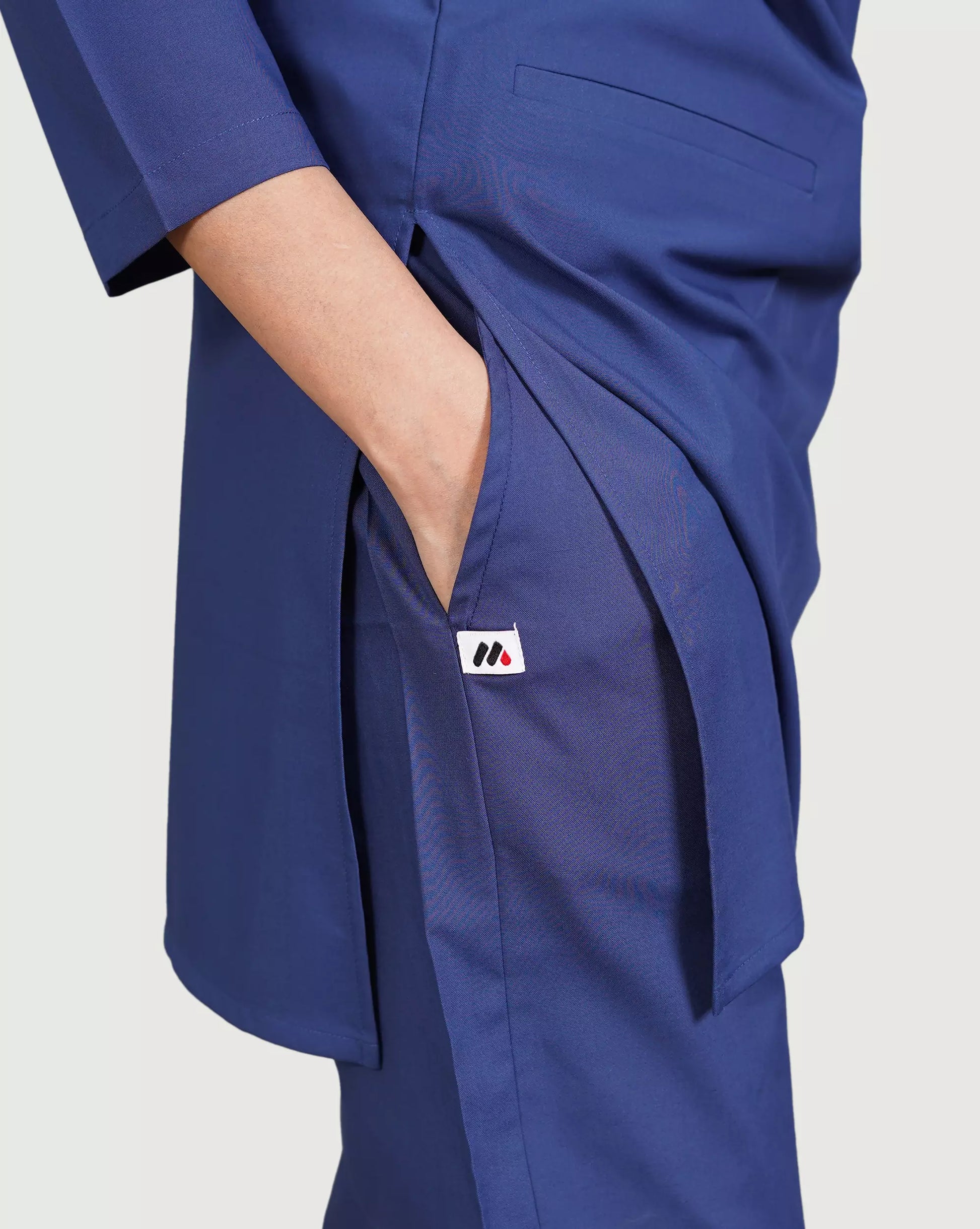 Pakistani doctors nurses wearing women longtop scrub medical uniforms Karachi hospital