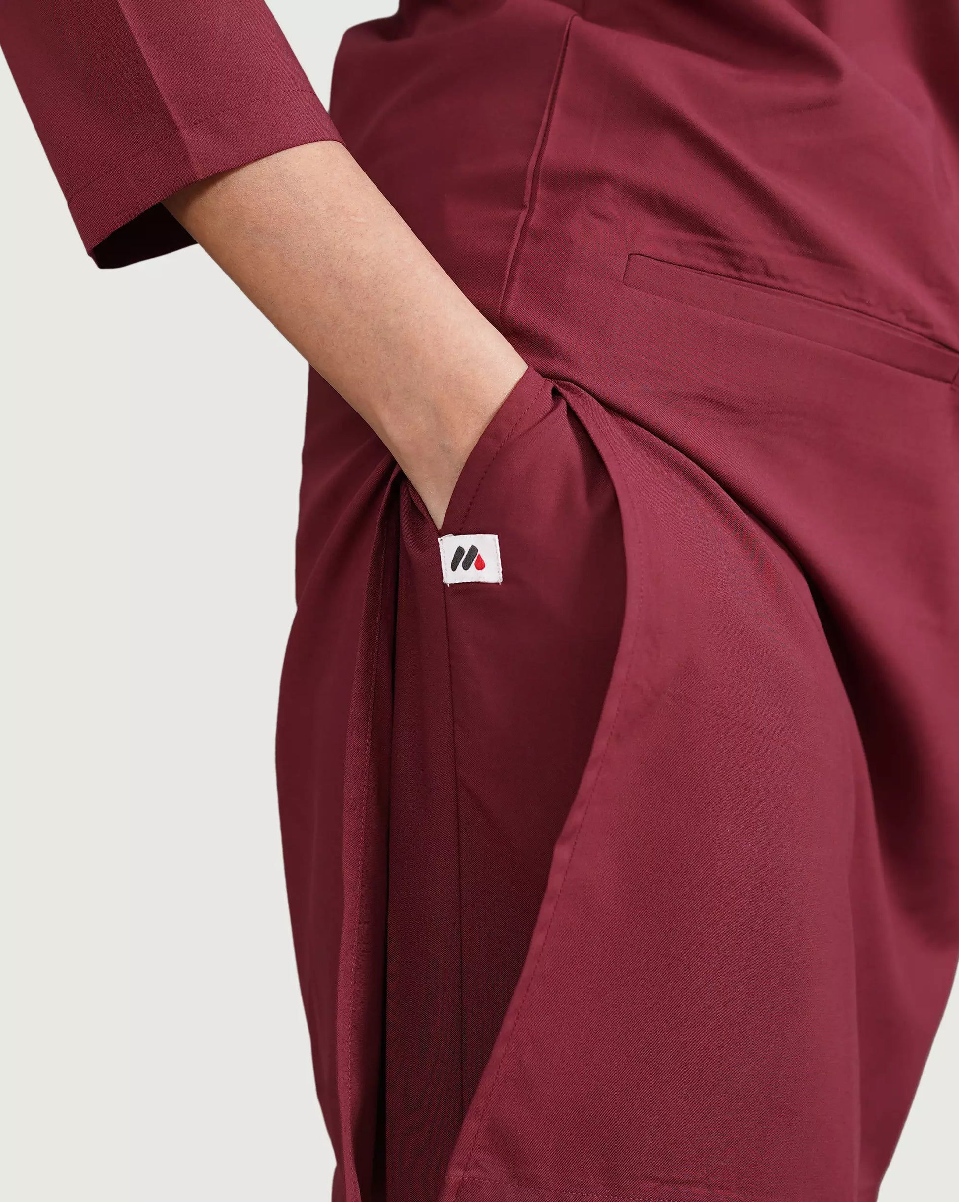 Female healthcare workers wearing women longtop scrub medical uniforms hospital setting
