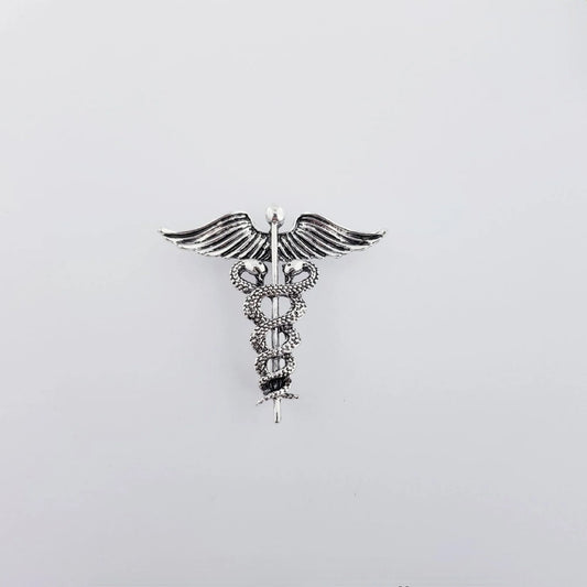 THE GOOD DOCTOR - ANTIQUE SILVER