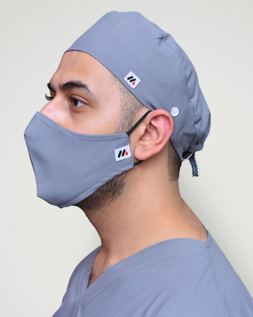 doc tor cover his face through masks and cap
