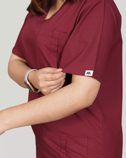 Full-body image of a male medical professional in a complete basic grey Medfit men's scrub set, offering a professional and comfortable uniform for healthcare environments.