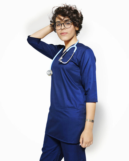 Female wearing a blue doctor scrub set with a stethoscope on a white background