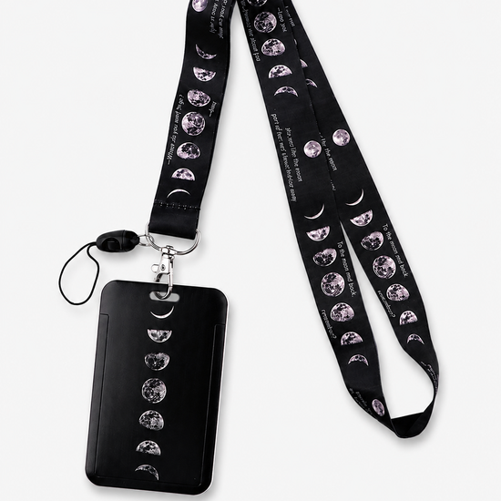 Sleek black neck lanyard with a celestial moon phases pattern and matching ID card holder by MedFit.