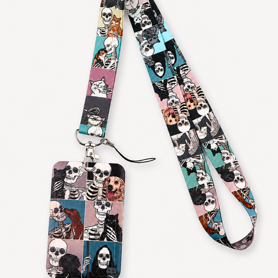 Fun Bone Buddies neck lanyard and matching ID badge holder featuring a colorful pattern of skeletons with pet cats and dogs, by MedFit.