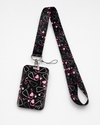 Cute black Care Beat neck lanyard and matching ID badge holder with a pink stethoscope and hearts pattern, by MedFit.