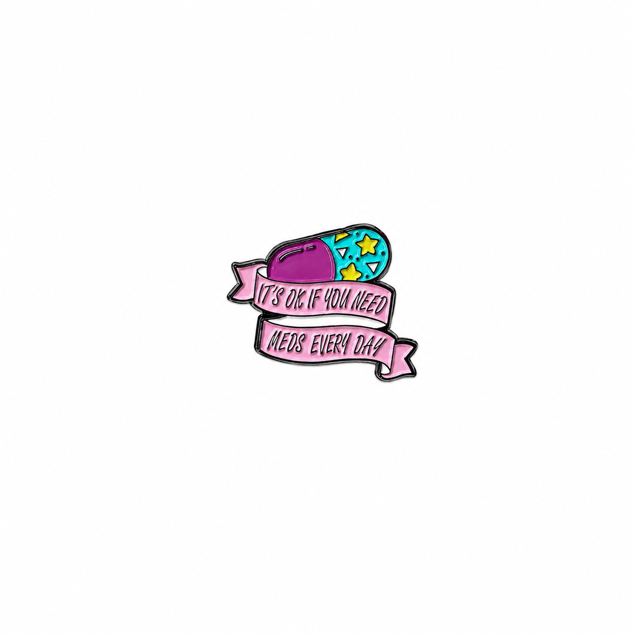 A colorful capsule enamel lapel pin paired with a pink banner featuring the text "IT'S OK IF YOU NEED MEDS EVERY DAY" against a white background.