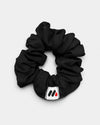 MedFit black fabric hair scrunchie with logo tag for nurses and healthcare workers.