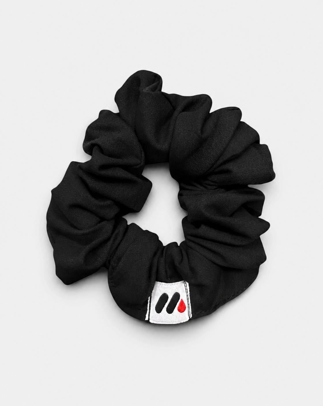 MedFit black fabric hair scrunchie with logo tag for nurses and healthcare workers.