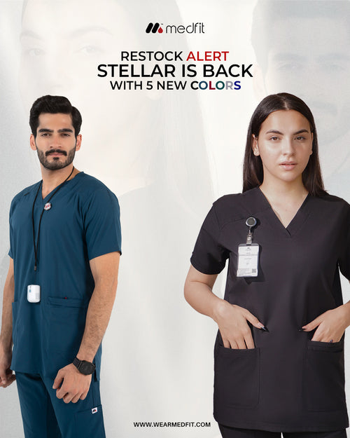 A promotional banner for Medfit medical scrubs announcing a product restock, featuring a male healthcare professional in dark teal scrubs on the left and a female healthcare professional in black V-neck scrubs with an ID badge on the right.