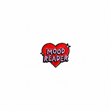 A red heart-shaped enamel lapel pin featuring the text "MOOD READER" in bold pink lettering against a white background.