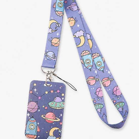 Charming lavender neck lanyard with a cartoon cosmic space and UFO pattern, complete with matching ID holder by MedFit.