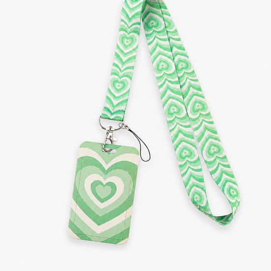 Aesthetic retro green and white layered heart print neck lanyard featuring a matching ID badge holder from MedFit.