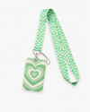 Aesthetic retro green and white layered heart print neck lanyard featuring a matching ID badge holder from MedFit.