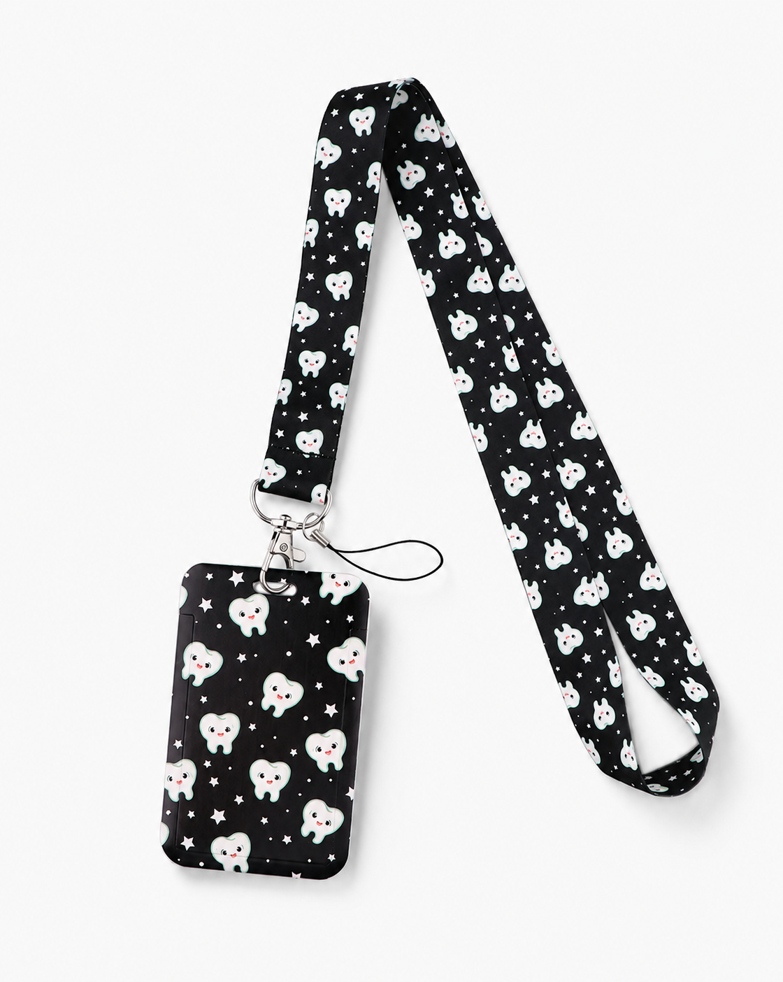 Cute black dental lanyard with a smiling teeth and stars pattern, featuring a matching ID badge holder by MedFit.