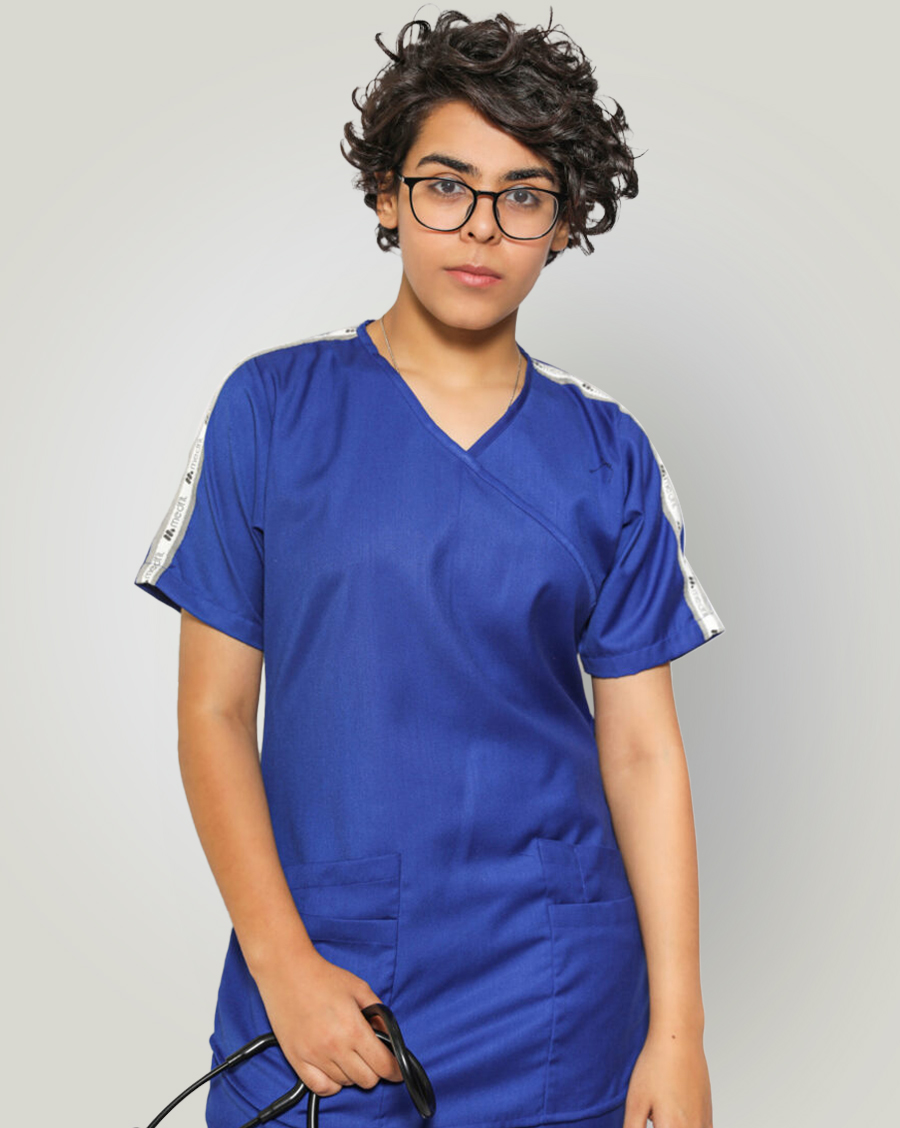 woman wear signature scrub in blue color and holding stethoscopes